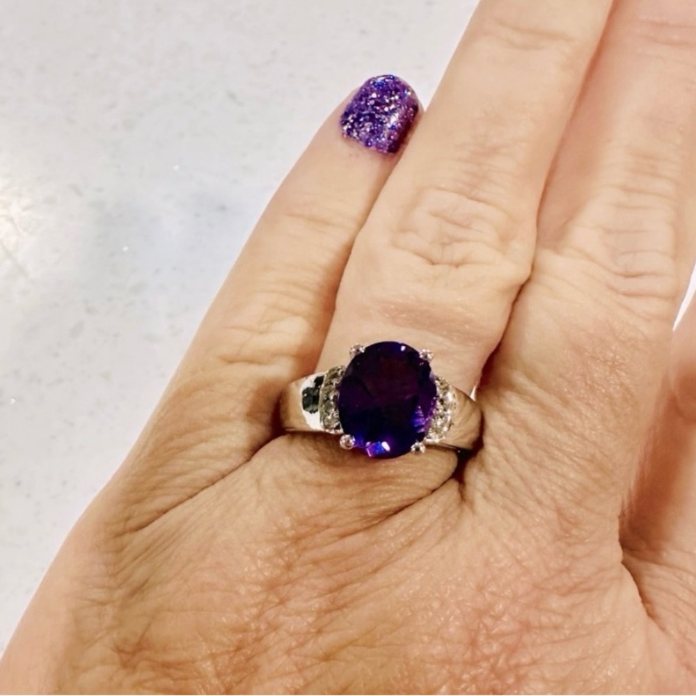 New Amethyst solitaire, 3.32 CTW, and white Topaz, 0.01 CTW, sterling silver…